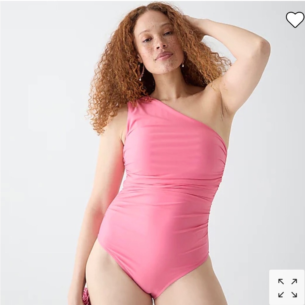 Ruched one shoulder swimsuit. Very flattering.